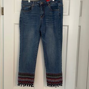 Jeans with embroidered hem